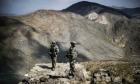 French soldiers in Afghanistan's Wardak province, where the health clinic was attacked and taken over by NATO troops. (Photograph: Jeff Pachoud/AFP/Getty Images)