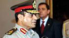 Egypt’s Defense Minister Abdel-Fattah el-Sissi warned of the “state of division in society,” saying the “the continuation of it is a danger to the Egyptian state and there must be consensus among all.” (File photo: AFP)