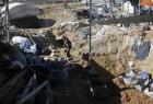 A Palestinian works at the entrance of a tunnel dug beneath the Egyptian-Gaza border in Rafah, in the southern Gaza Strip November 26, 2012. (Reuters/Mohammed Salem)