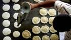 Confectioners in a Syrian refugee camp have been preparing qatayef, a traditional Ramadan sweet, for their fellow residents. (File photo: AFP)